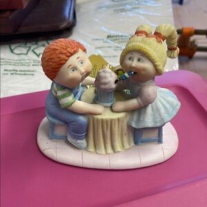 Charming Figurine with Boy and Girl Sharing a Milkshake